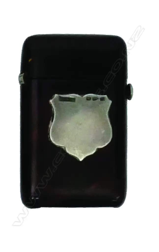 A tortoiseshell vesta case with silver shield Image 1++