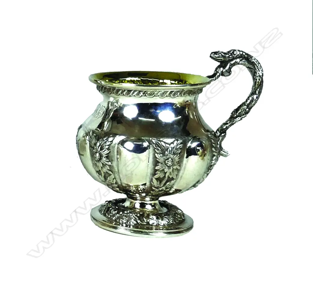 A silver mug Image 1++
