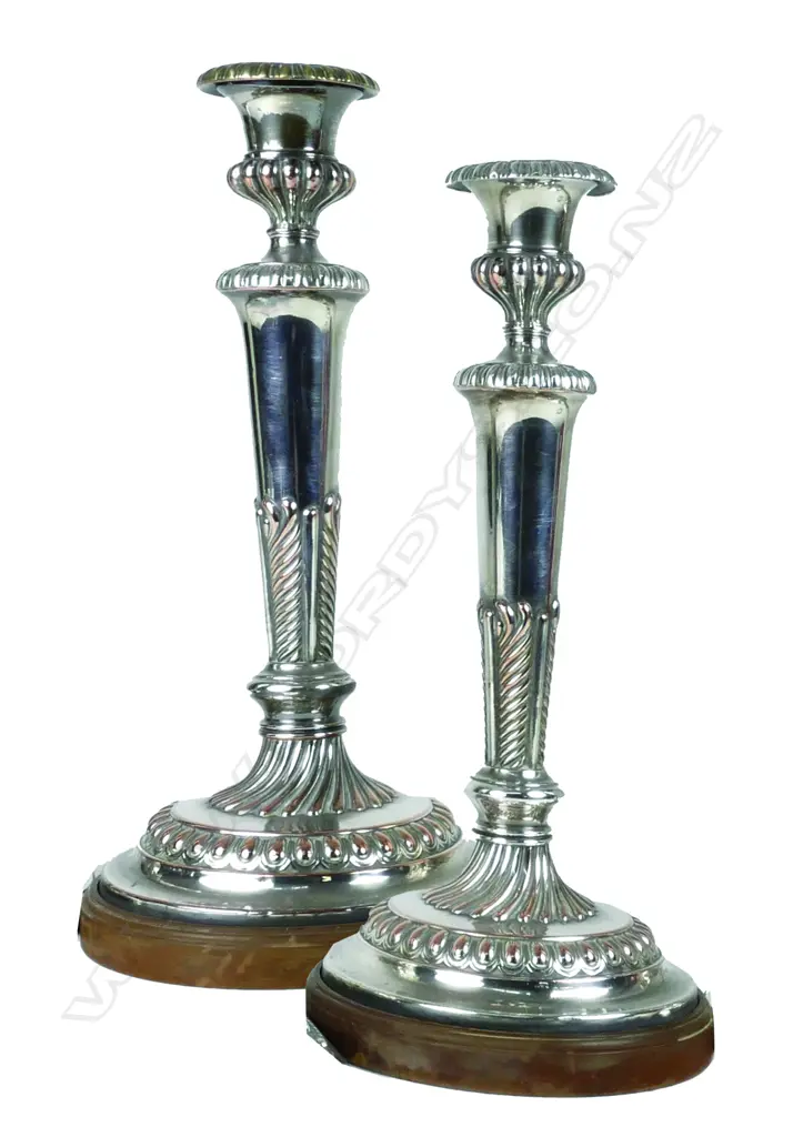 A pair of Old Sheffield Plate candlesticks Image 1++