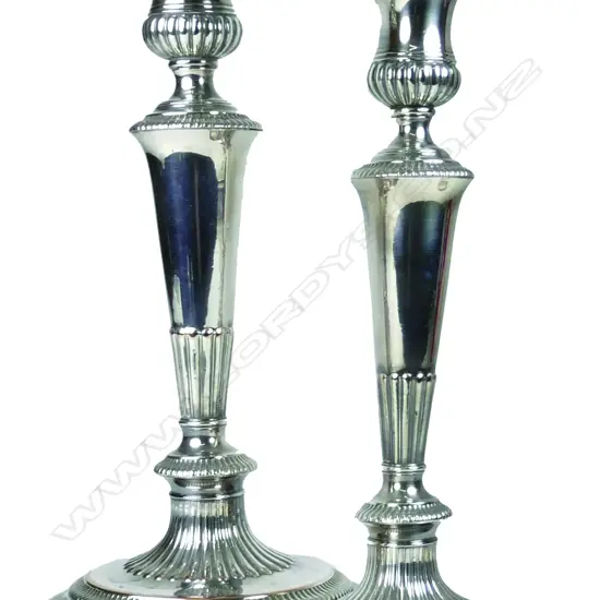 A pair of Old Sheffield Plate candlesticks