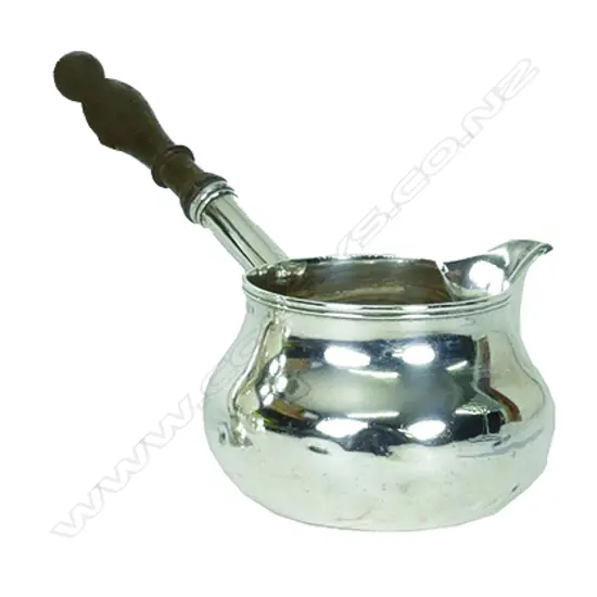 A rare large George III Irish silver large brandy pan