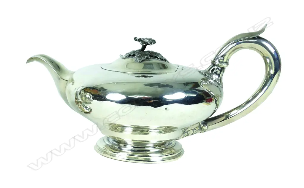 A Victorian silver teapot Image 1++