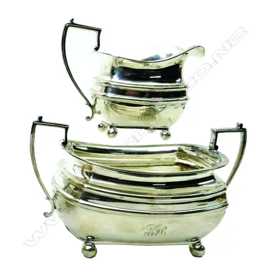 A pair of quality Edwardian heavy silver sugar bowl and cream jug
