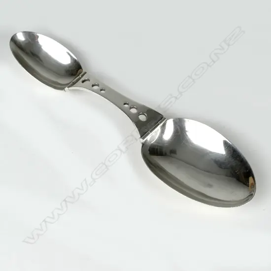 An early 20thC American silver folding spoon