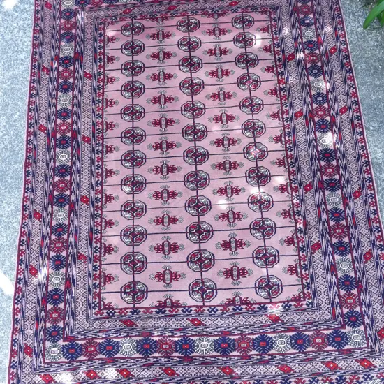 A finely knotted Bokhara rug