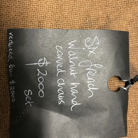 A set of six French carved walnut side chairs