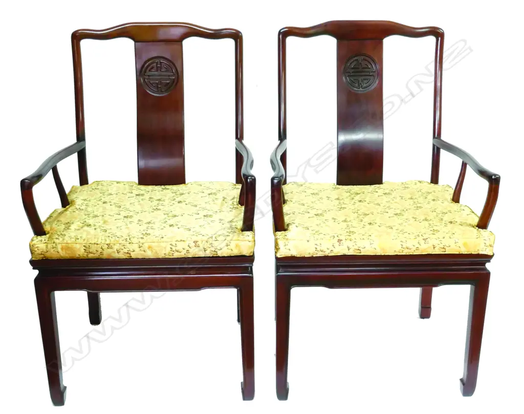 A Chinese rosewood extension banquet table and eight chairs Image 1++