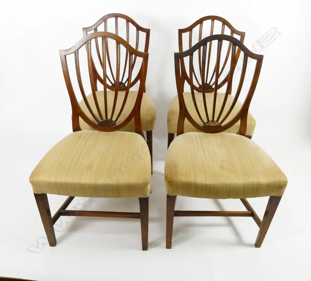 A set of four Hepplewhite-style walnut dining chairs Image 1++