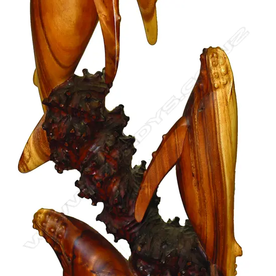 A Brian Webb (N.Z.) well carved Tasmanian blackwood carving of three leaping humpback whales