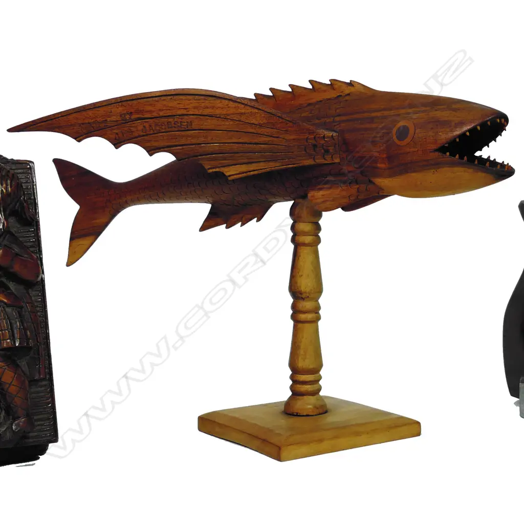 A carved wood Pitcairn Island flying fish sculpture Image 1++