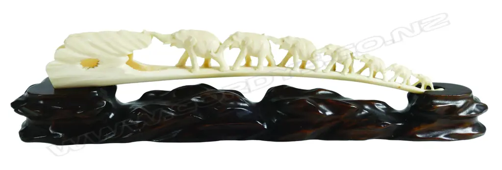 An old carved ivory tusk elephant bridge Image 1++