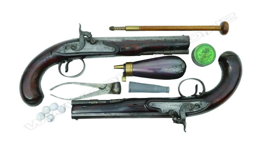 A pair of George III percussion pistols by Knubley in later case Image 1++