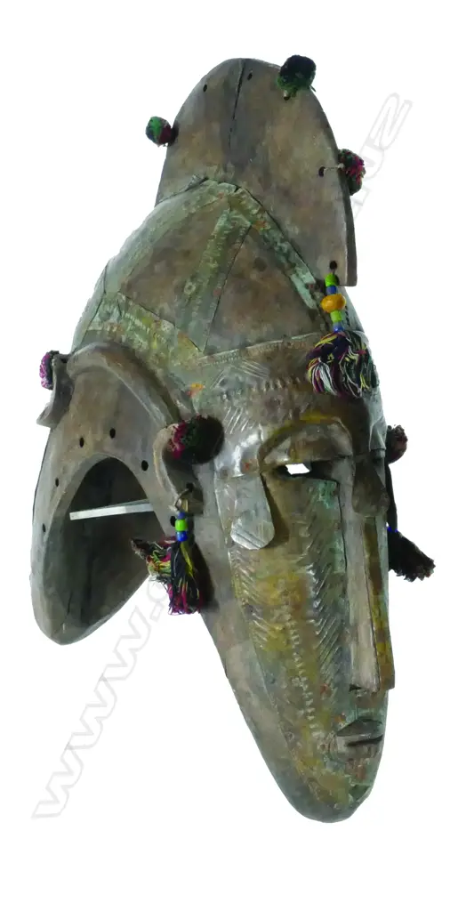 A West African carved wood Janus mask Image 1++