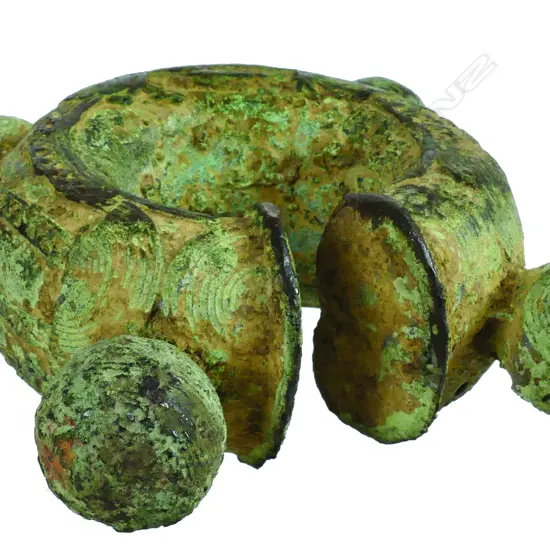 A West African (Benin) bronze torus device.  Reputedly a ritual object to indicate potable water and avoid its pollution