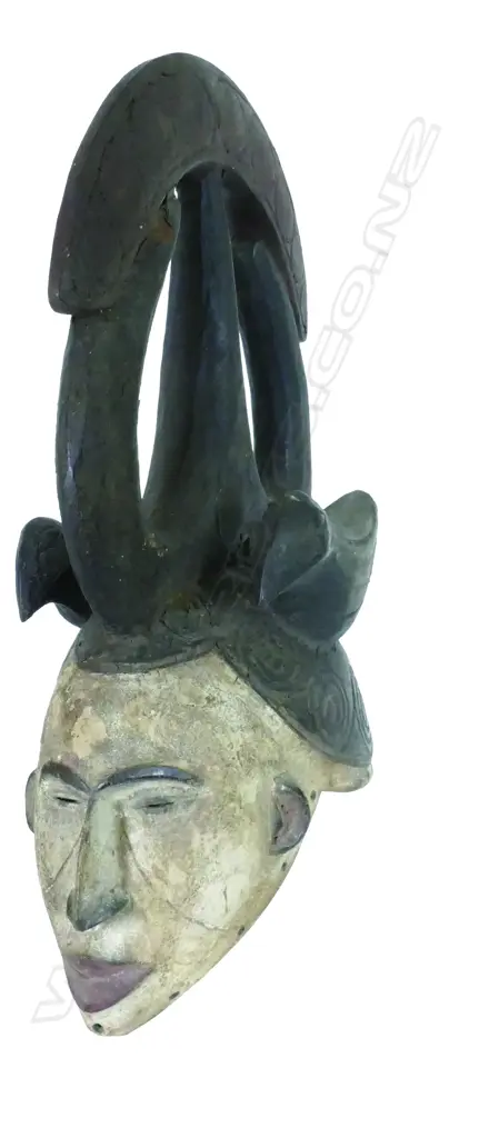 A West African helmet mask Image 1++