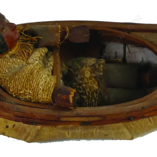 A folk art North American Indian canoe model