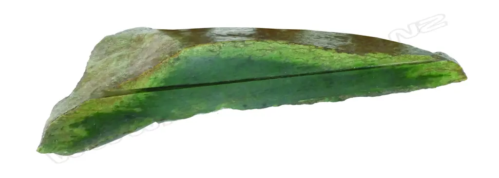 A wedge shaped slab of high quality pounamu (nephrite) Image 1++