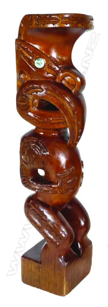 A Maori carved stylised figure Image 1++