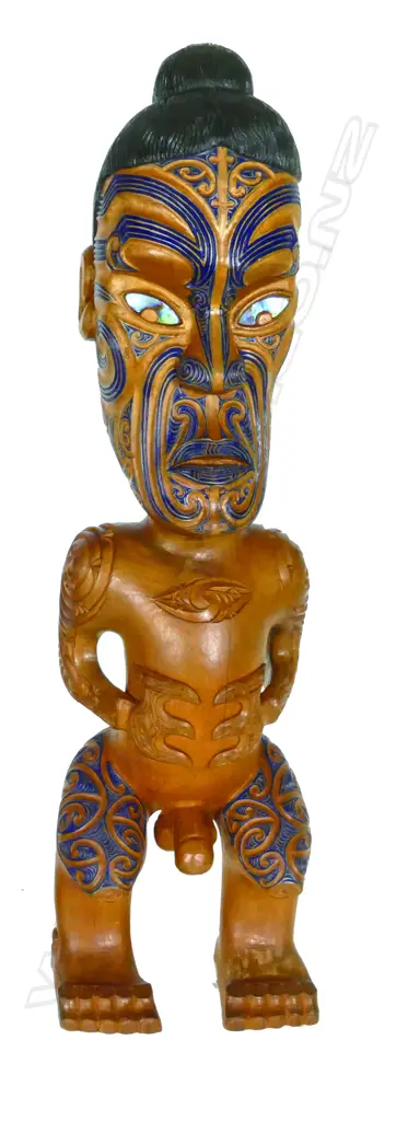 A modern Maori finely carved stylised figure Image 1++