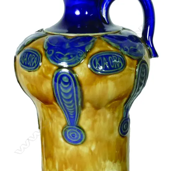 A Royal Doulton stoneware 'Kia Ora' decanter with original compressed stopper