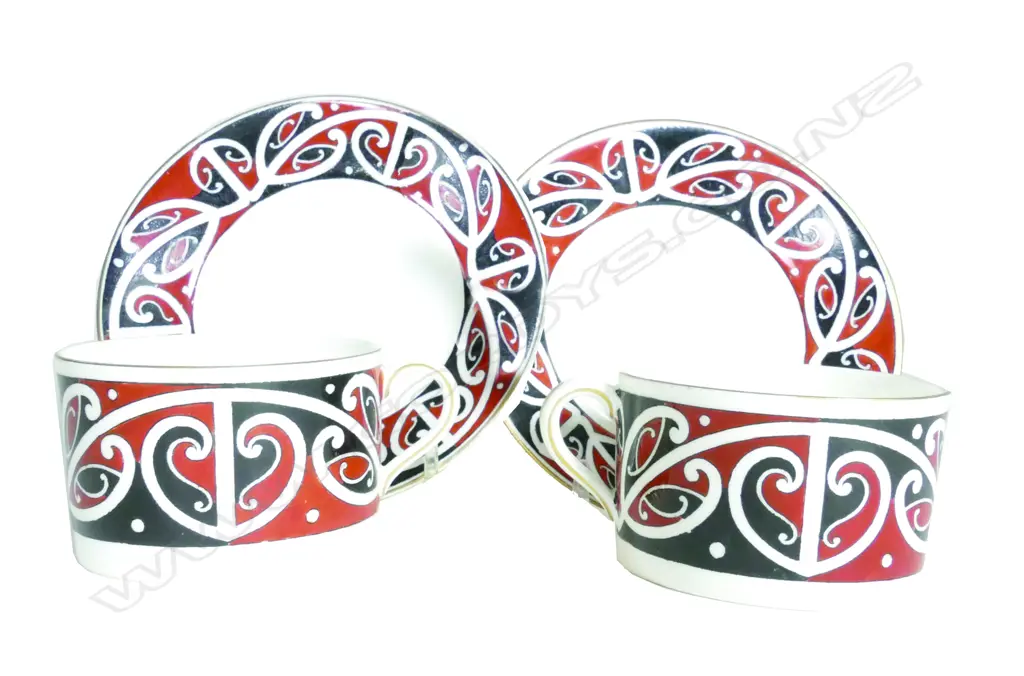 A pair of Royal Doulton 'Maori Arts' porcelain coffee cans and saucers Image 1++