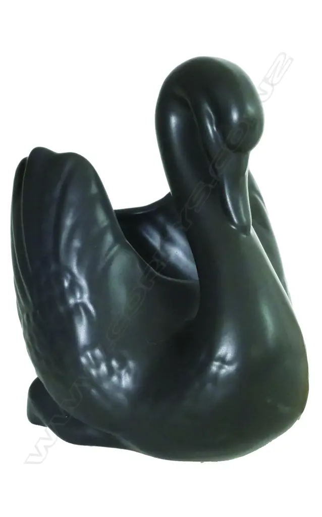 A Crown Lynn medium size black glazed swan Image 1++