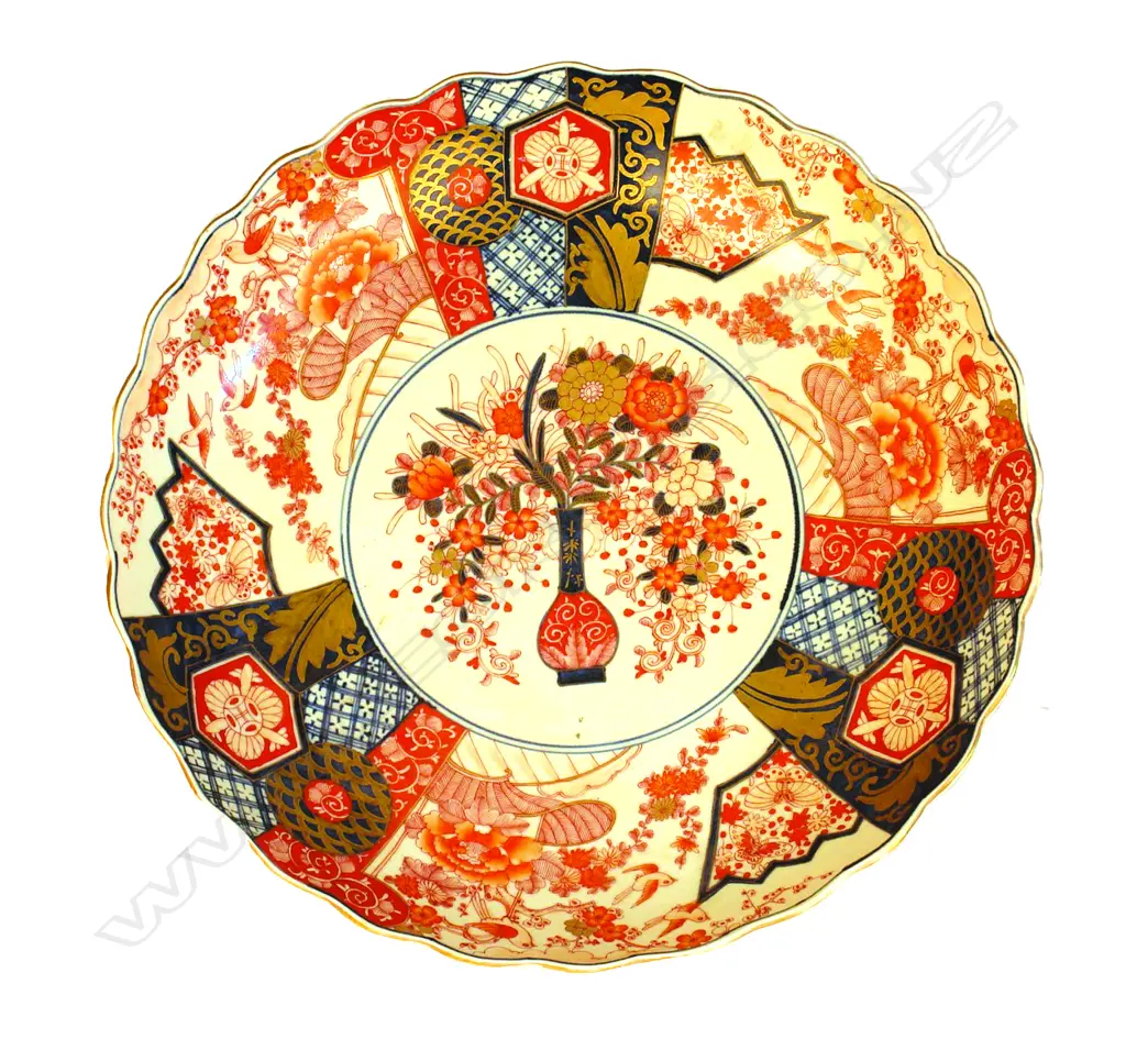 A large Japanese Imari porcelain charger Image 1++