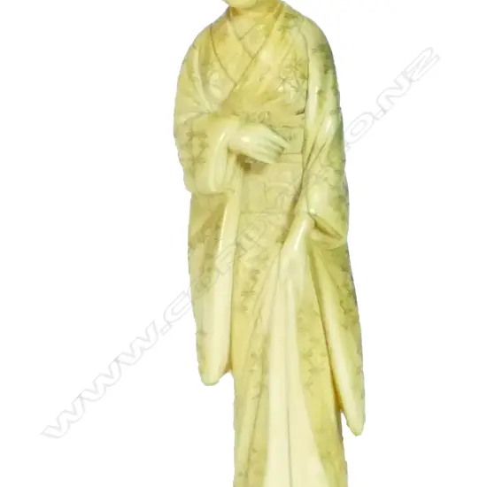A Meiji period Japanese carved marine ivory figure of a geisha