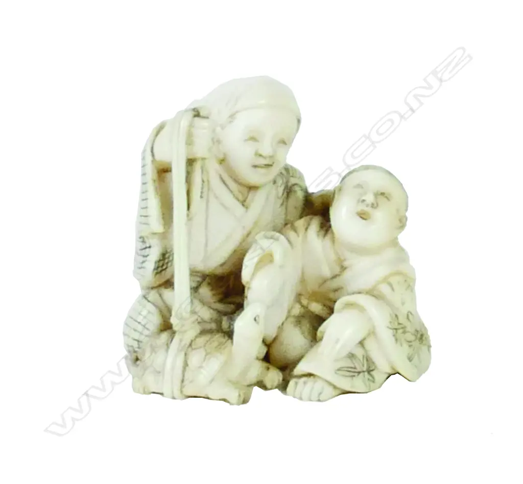An ivory netsuke Image 1++