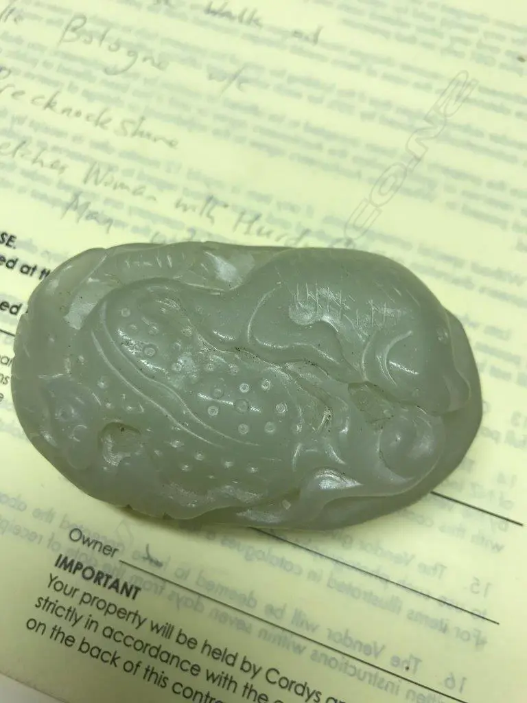 A Chinese pale jade handling piece Image 1++