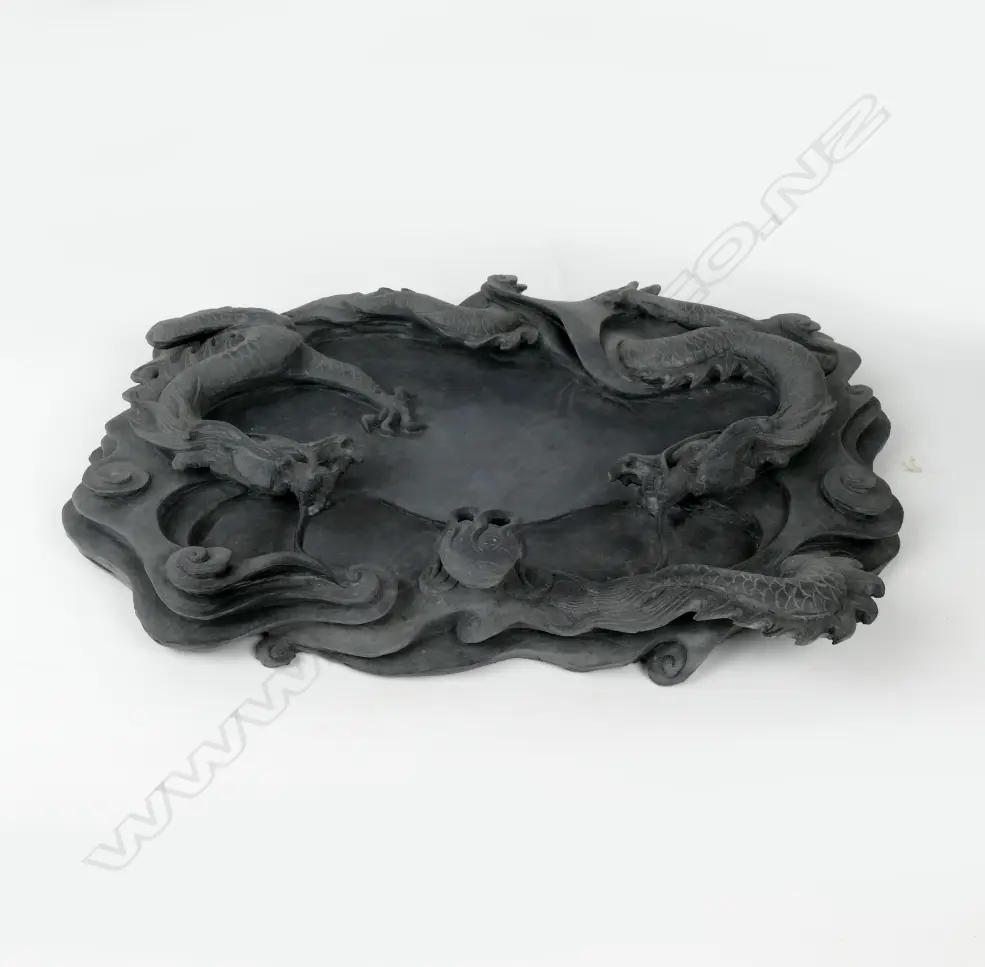 A Chinese highly carved deep relief black ink stone Image 1++