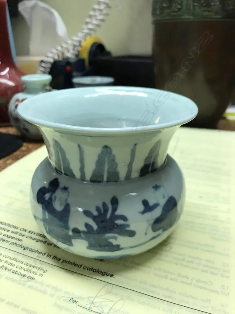 A Chinese blue and white small vase Image 1++