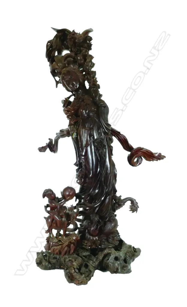 A large rosewood carved figure of Kwan Yin Image 1++