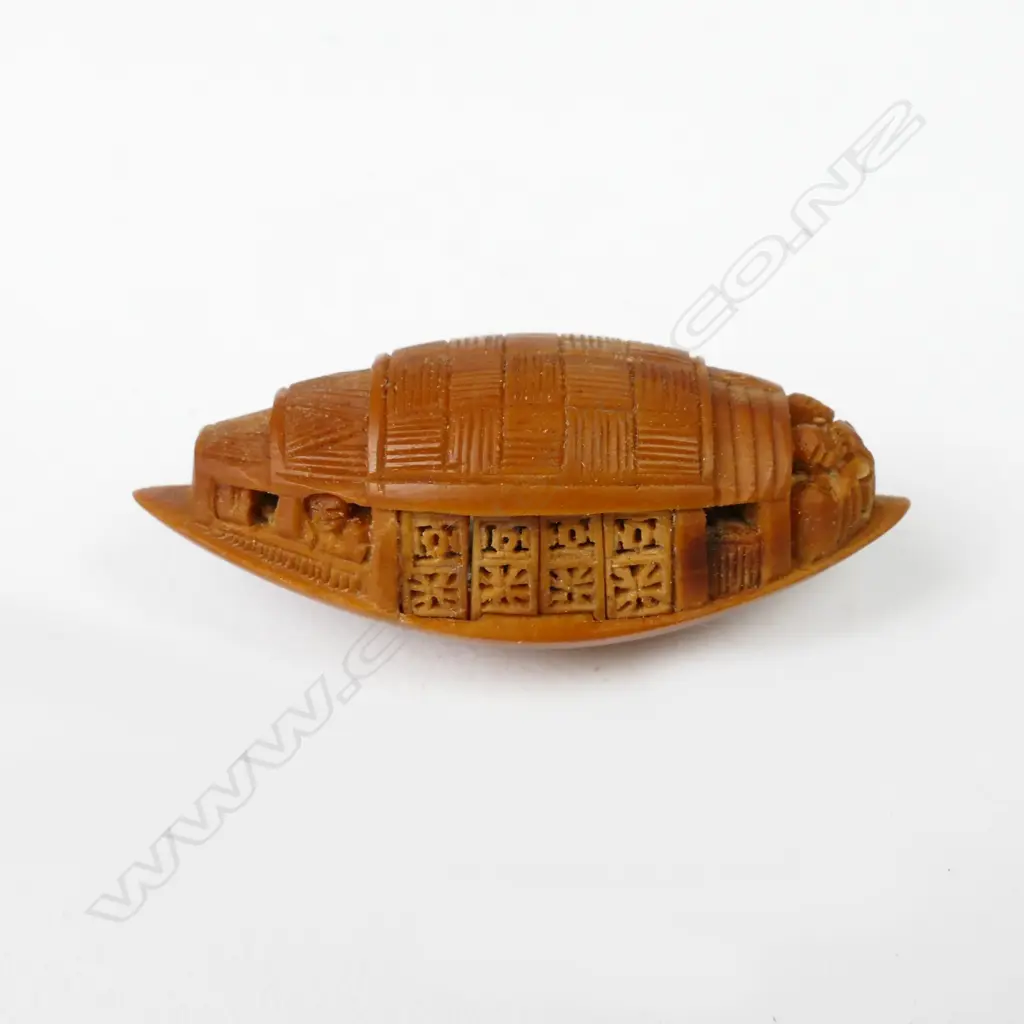 A Chinese carved peach pip Image 1++