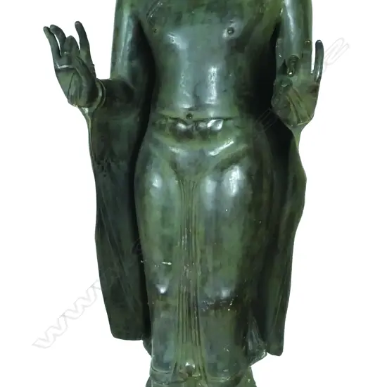 A large bronze standing Buddha