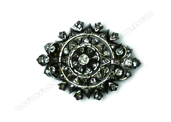 An antique silver and diamond brooch Image 1++