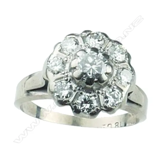 An 18ct. white gold diamond cluster ring