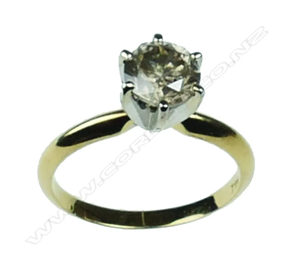 A 14ct. gold and diamond solitaire ring Image 1++
