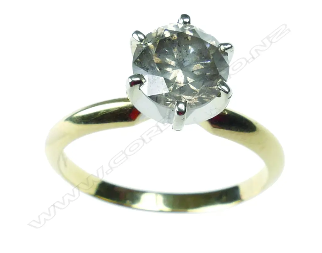 A 14ct. gold and diamond solitaire ring Image 1++