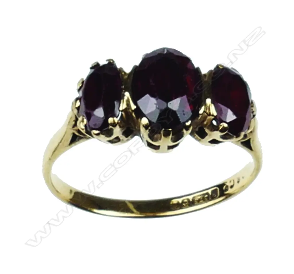Two vintage lady's 9ct. gold and garnet set rings Image 1++