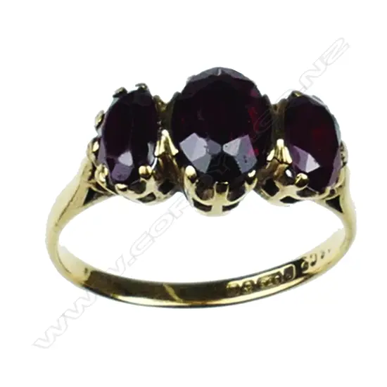 Two vintage lady's 9ct. gold and garnet set rings