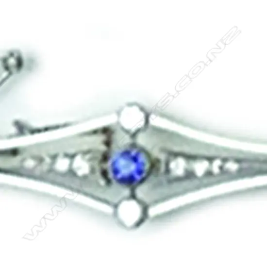 An Art Deco 18ct. yellow and white gold diamond and sapphire brooch