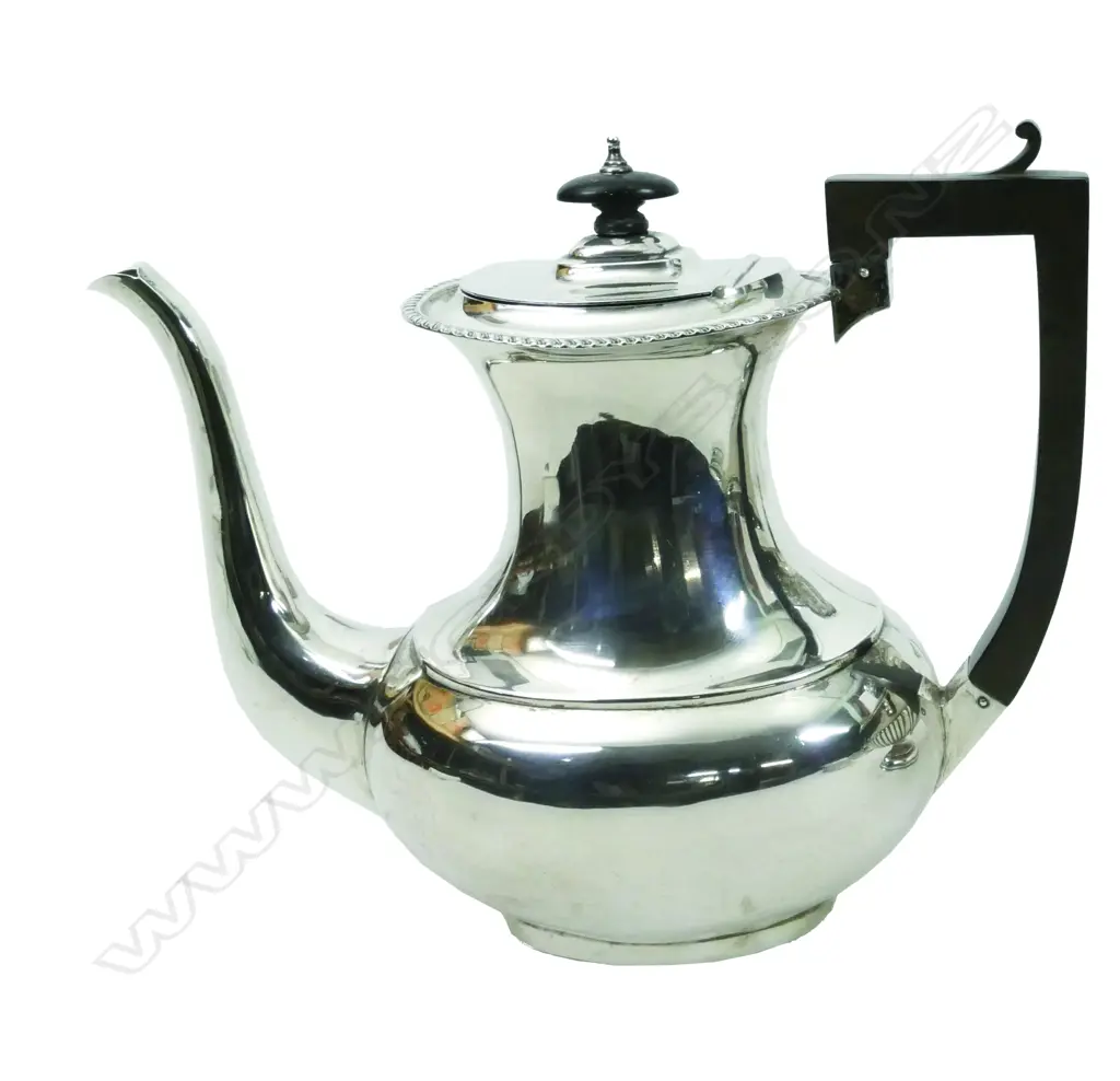 A George IV silver coffee pot Image 1++
