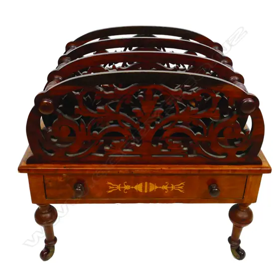 A Victorian walnut canterbury