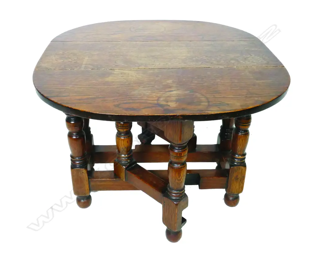 A small low vintage oak gateleg occasional table Image 1++
