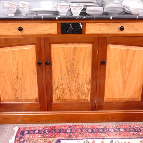 A modern N.Z. craftsman made marble top sideboard by Hayman & Whetton