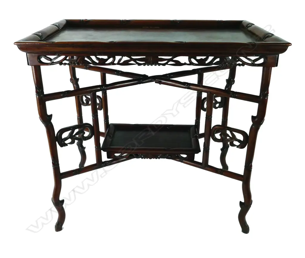 A Chinese teak folding occasional table Image 1++