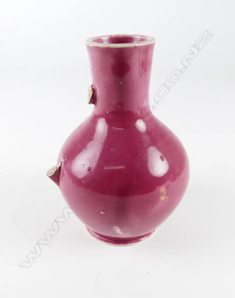 P. Hutson & Co. red glazed bottle vase Image 1++