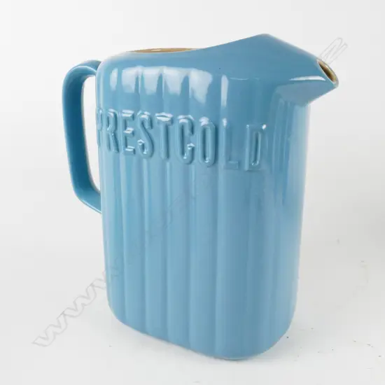 An uncommon Crown Lynn teal blue McAlpine/Prestcold refrigerator jug