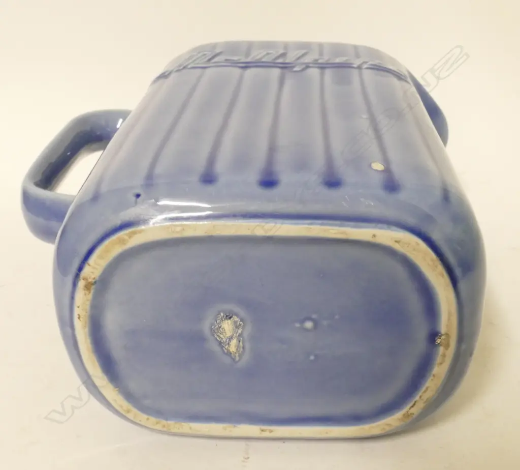 An uncommon Crown Lynn dark blue McAlpine refrigerator jug Image 1++